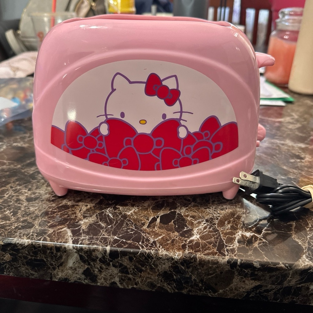 Hello Kitty Pink Kitchen toaster New - toasts hello kitty picture onto bread.